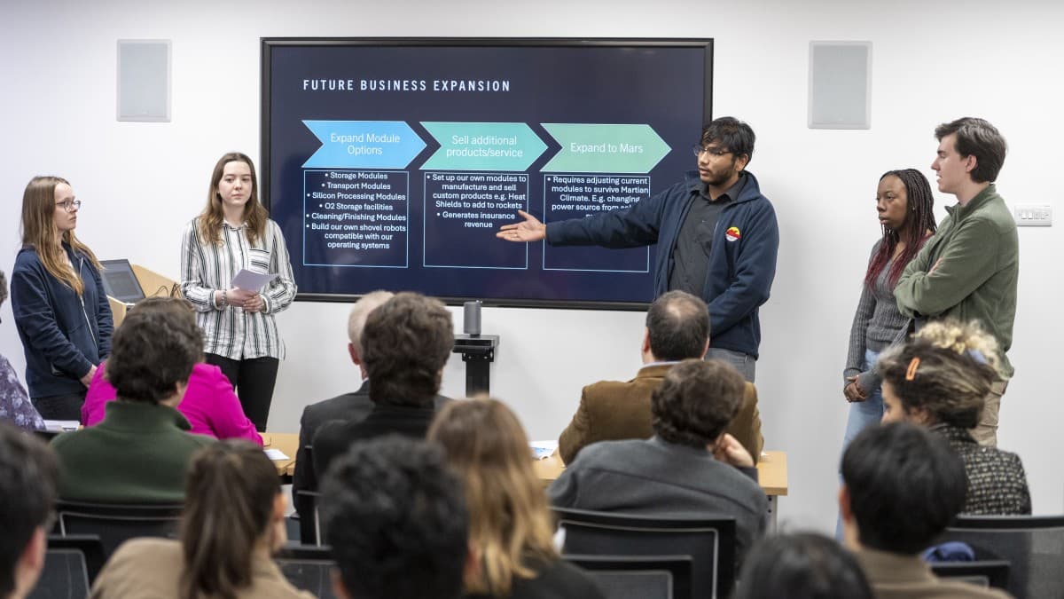 Students presenting a hackathon project
