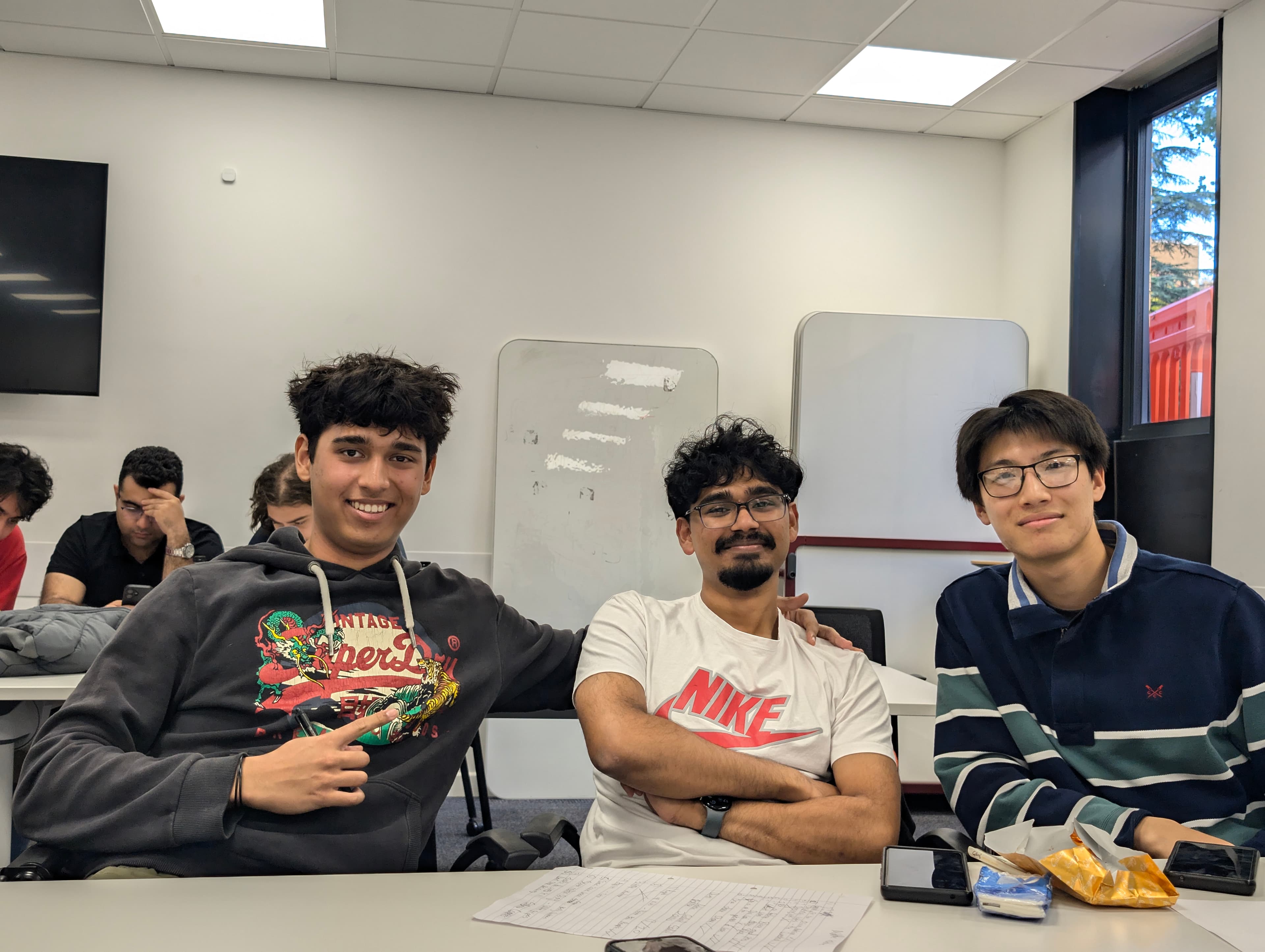 3 students enjoying our gamenight